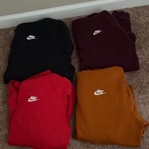 Nike hooded Sweatshirts in Black, Burgundy, Red & Rust